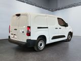 a white van that is parked in a garage