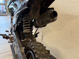 a dirt bike that is parked in a building
