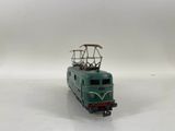 a toy train that is sitting on a white surface