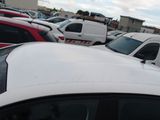 a lot of cars that are parked in a parking lot