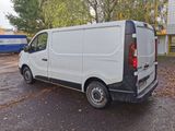 a white van that is parked in the parking lot
