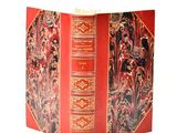 a red book that has a picture of people on it