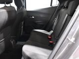 the back seats of a car with a seat belt in the back