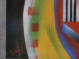 graffiti on the wall of a building with a red, yellow, blue, and green design
