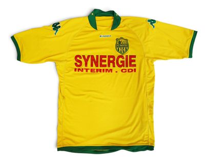 a yellow and green soccer jersey with a green collar