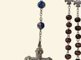 a rosary and a cross hanging from a chain