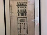 a picture of a drawing of a building on the wall