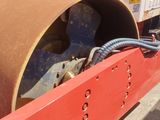 an image of a construction vehicle that is being worked on