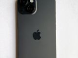 a picture of an iphone with a charging cable attached to it