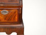 an old wooden desk with a drawer on top of it