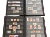 four different types of stamps are displayed in a black folder