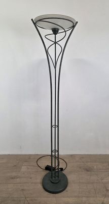 floor lamp with a glass top and a metal base