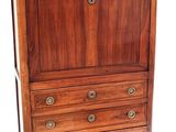 an image of a wooden chest of drawers on a white background