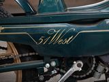 a close up of a motorcycle with a chain attached to it