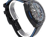 an image of a black watch with a blue band on a white background