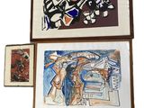 three paintings hanging on the wall next to each other