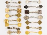 a group of nine pairs of gold and silver bracelets