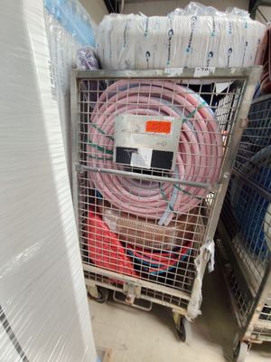 a cart that has a bunch of hoses in it