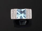 an aquamarinee and diamond ring