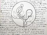 a handwritten letter on a piece of paper with a drawing on it
