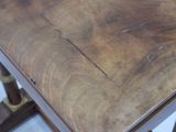 a close up of a table with a wooden top
