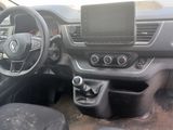 the interior of a car with a steering wheel, dashboard, and dashboard controls