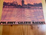 a picture of a picture of a clock tower on a table