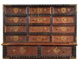 an image of a chest of drawers with many drawers