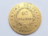 an image of a gold coin with the number 40 on it