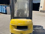 an image of a forklift parked in a parking lot