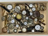 a wooden box filled with lots of different types of watches