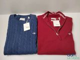 two men ' s sweaters, one red and one blue