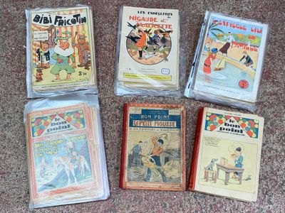 Plusieurs livres pour enfants sont alignés par terre