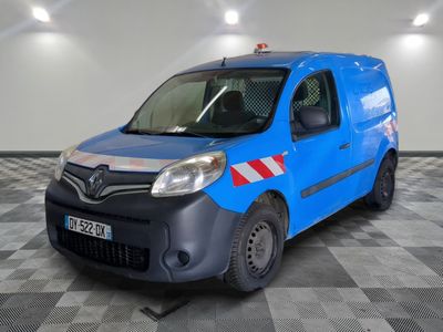 a picture of a blue van parked in a garage