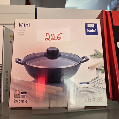 une boîte sur laquelle est représenté un ustensile de cuisine