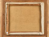 an old picture frame with a piece of wood in it