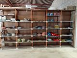 many shelves with different types of pottery on them