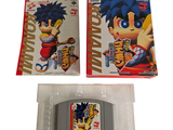 two boxes of nintendo games sitting on a white surface