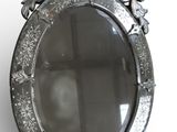 a mirror that is hanging on the wall in the room