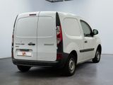 a white van that is parked in a room