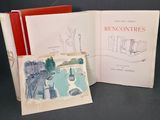 Deux livres sont ouverts sur une table, sur laquelle figure le dessin d'une maison.