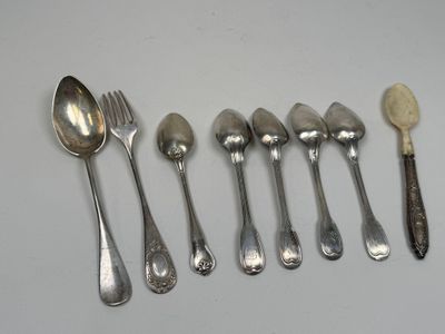five spoons and six spoons on the table