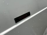 an image of a close up of a sticker on the side of a car