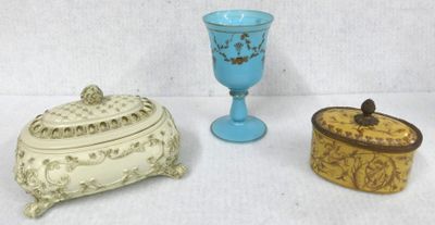 three different types of vases sitting on a white surface