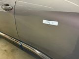 a sticker on the side of a car door