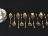 a lot of spoons and spoon spoons on the table