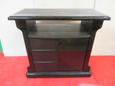 a black table with drawers and a shelf on top of it