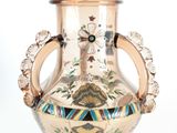 a vase with a handle on a white background
