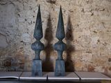 two statues that are on top of a table