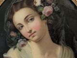 painting of a woman with flowers in her hair in a gold frame
